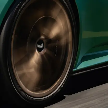 Upclose Aston Martin DB12 tire in motion