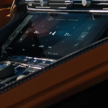 Upclose view of Aston Martin DB12 center console screen