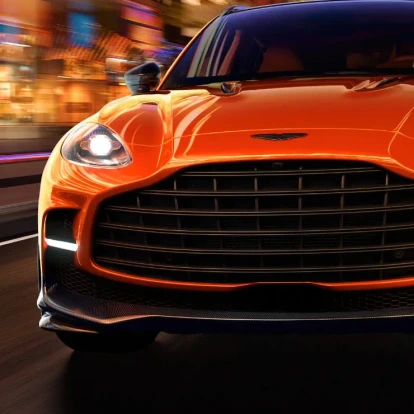 Upclose view of orange Aston Martin DBX707