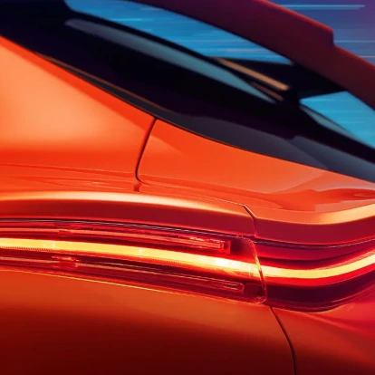 Upclose view of back tail light on orange Aston Martin DBX707